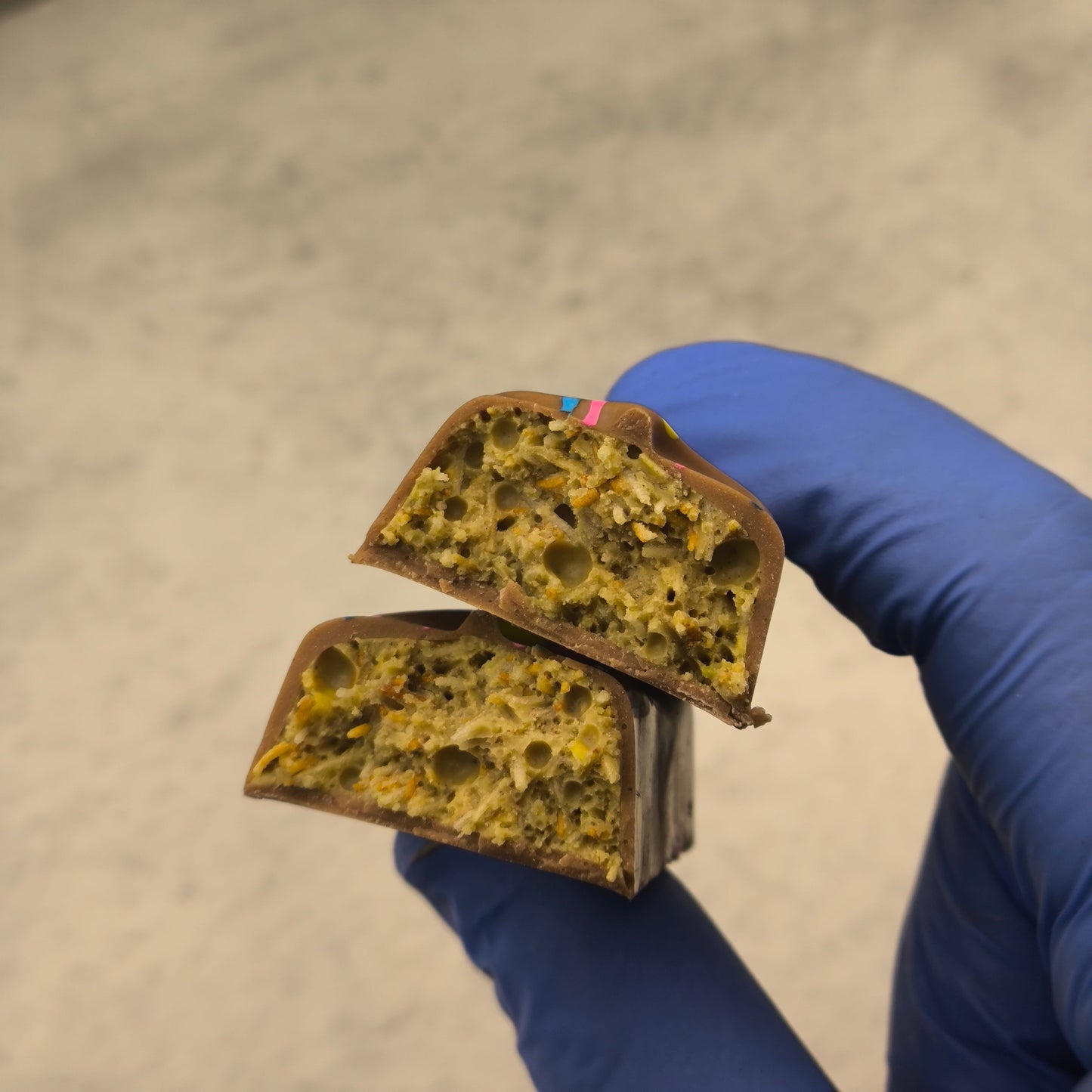 120g Dubai pistachio bar cut in half