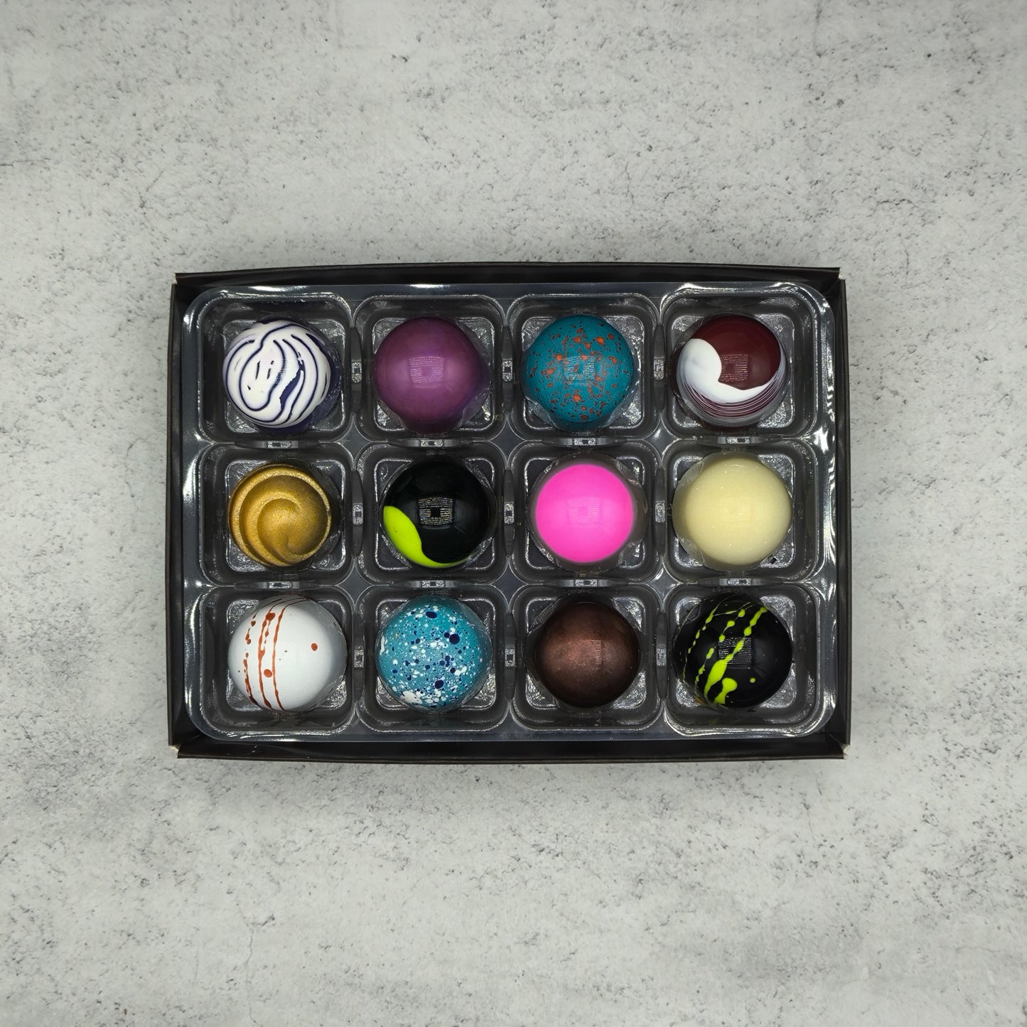 A top view of our 12 artisan bonbon selection box